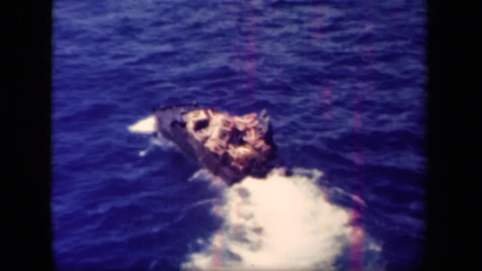 Small military-style landing craft crosses open water in footage identified as Leyte Gulf, Philippines, 1944.