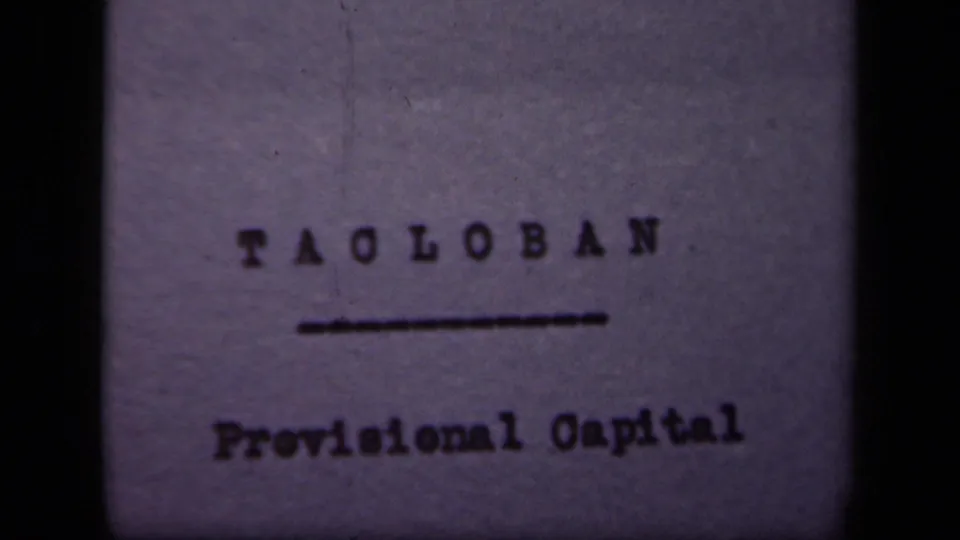 8mm title card identifies the location as Tacloban and includes the words Provisional Capital beneath an underline.