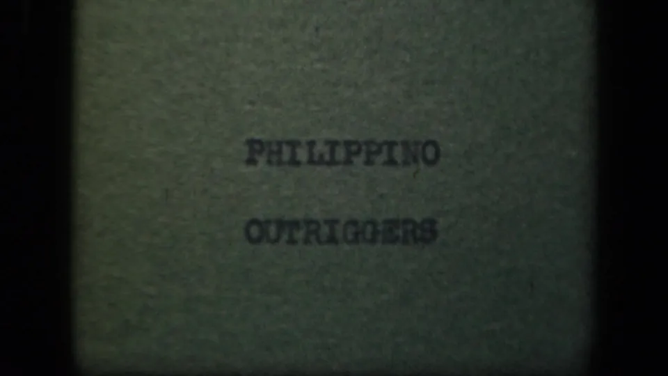 Opening title card for the 1944 Leyte Gulf clip, with dark type on a greenish 8mm frame reading “PHILIPPINO OUTRIGGERS.”