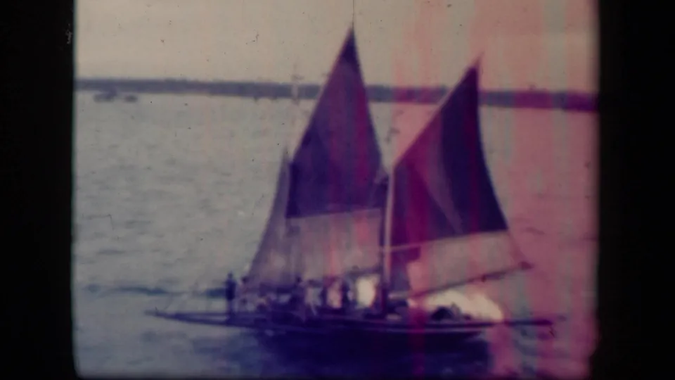 Near the end of the clip, the Leyte Gulf sailboat remains in view with passengers aboard and a small craft visible farther back.