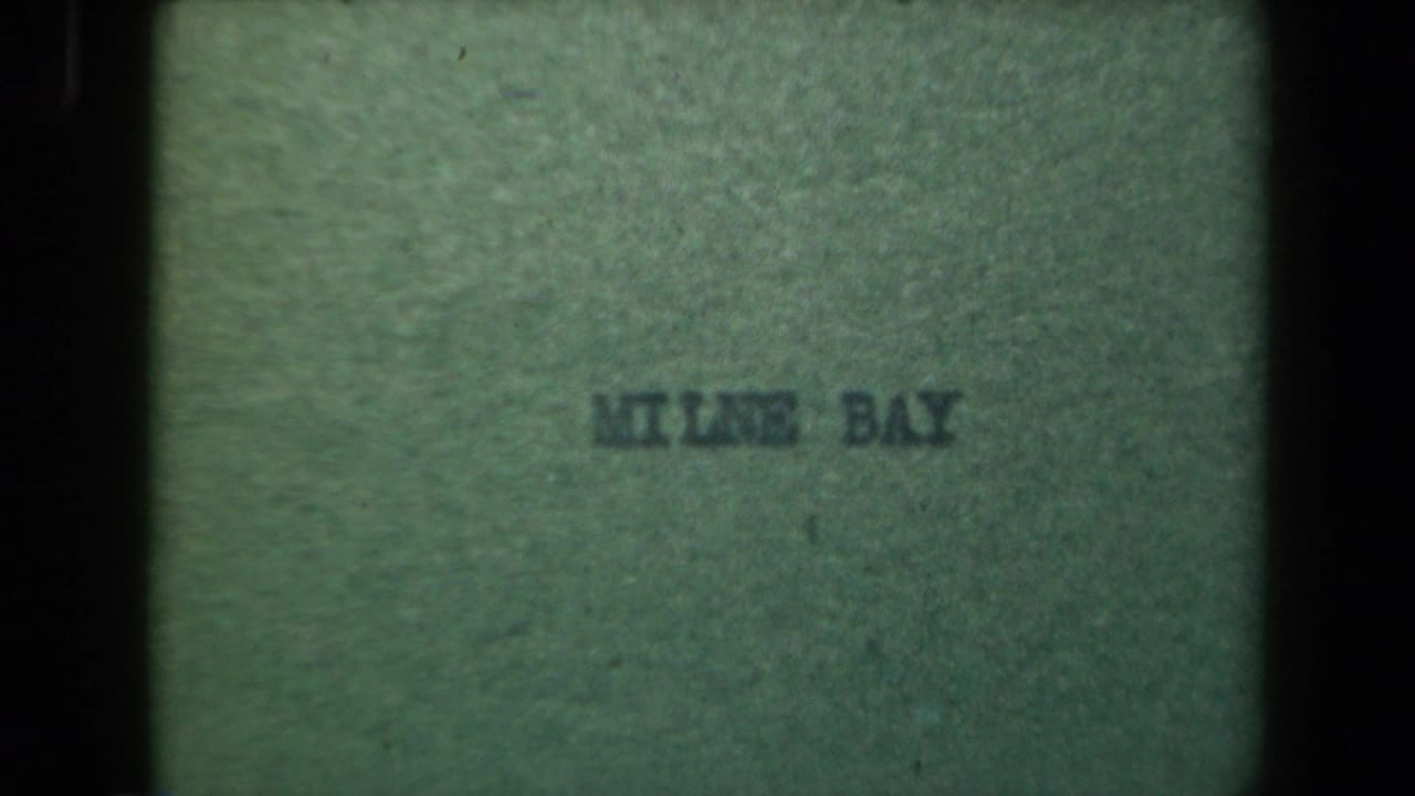 Green title frame with the words KILME BAY visible in dark lettering.