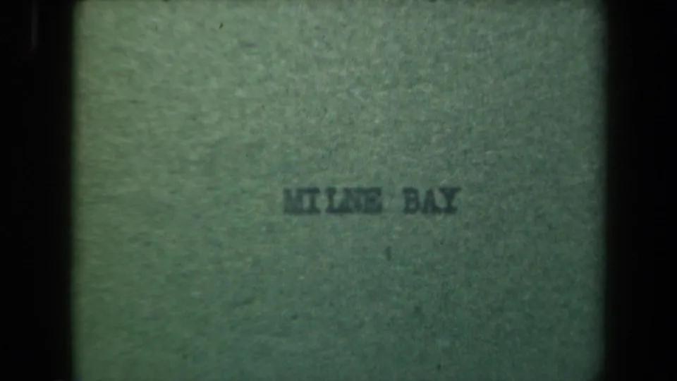 Papua New Guinea home-movie title frame from 1944 showing a green card with KILME BAY typed or stamped near the center.