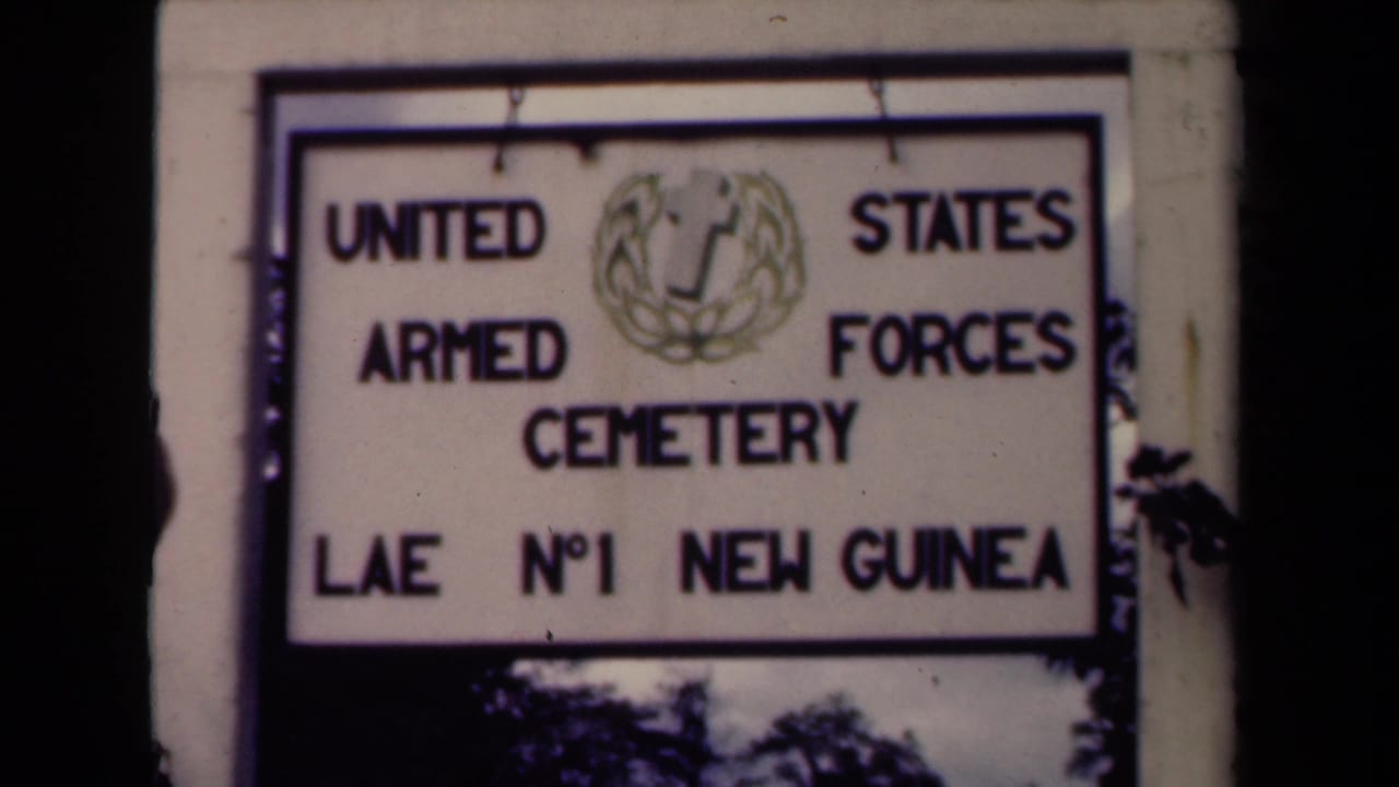 Sign reading United States Armed Forces Cemetery Lae No. 1 New Guinea.