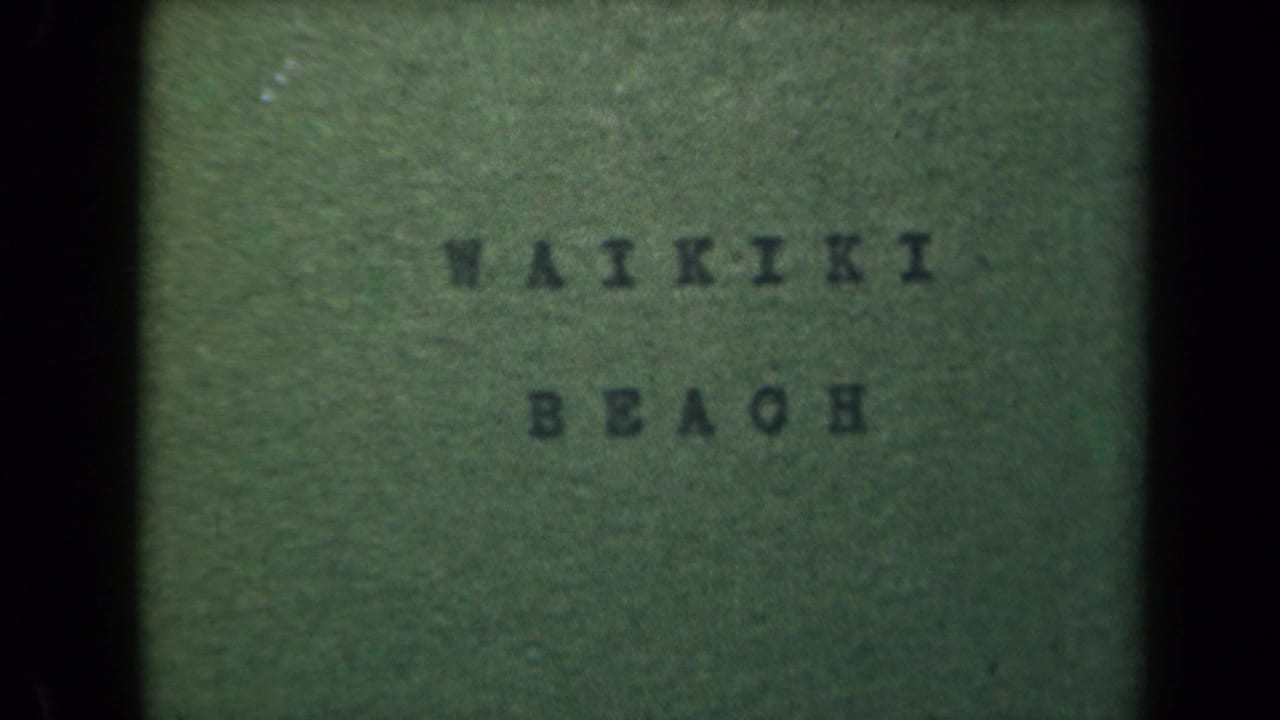 Repeated 8mm title frame for Waikiki Beach, with faded green background, dark letters, and visible film borders.