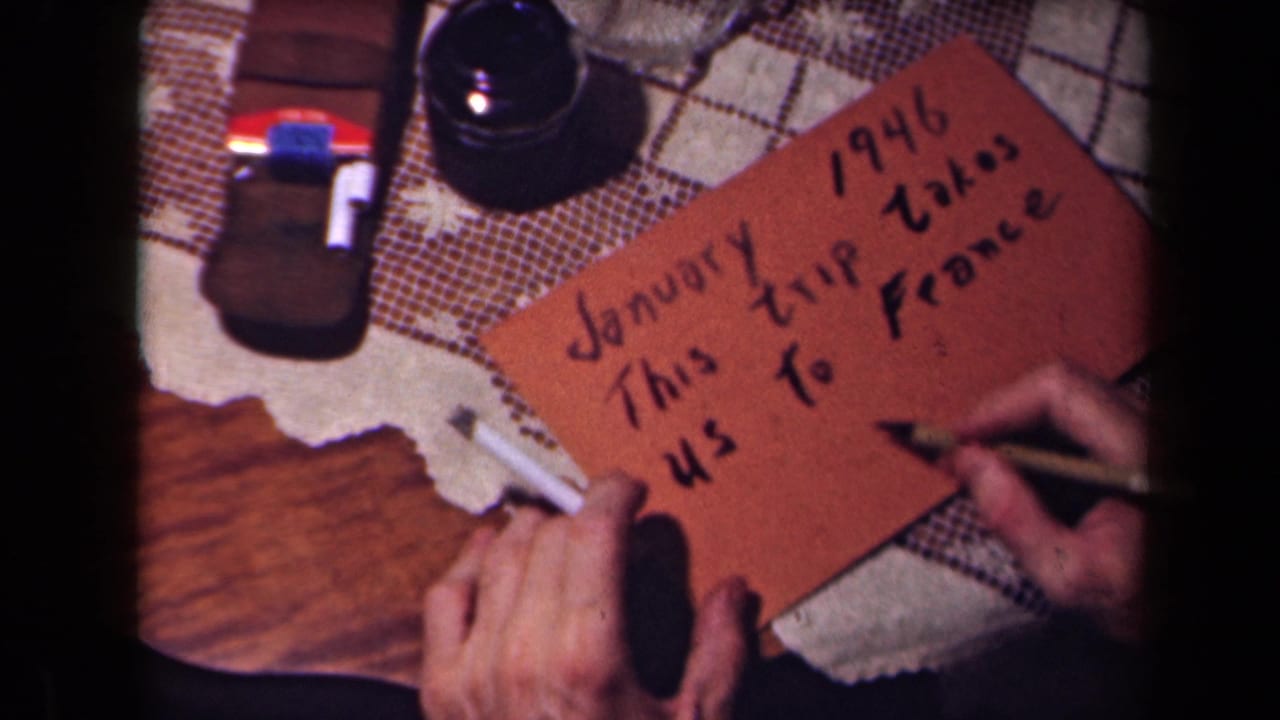 A hand writes on a brown card reading January 1946 and France.