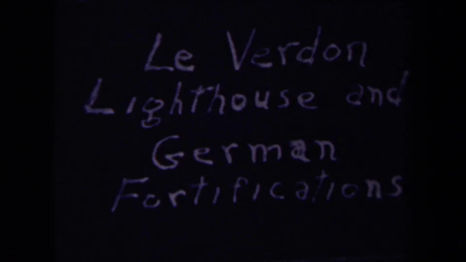 Handwritten 8mm title card identifying Le Verdon lighthouse and German fortifications in France.