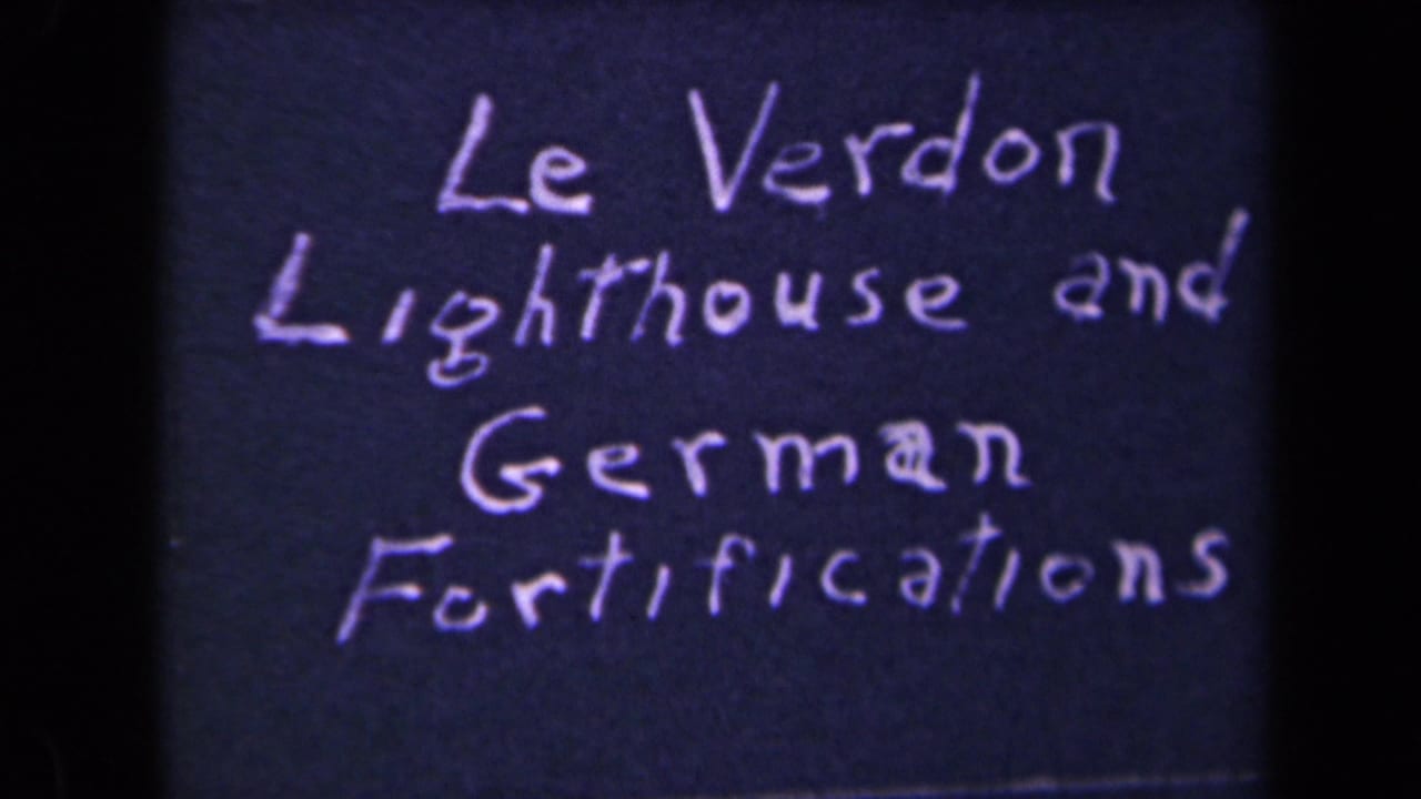 Repeated title-card frame naming Le Verdon lighthouse and German fortifications on dark 8mm film.
