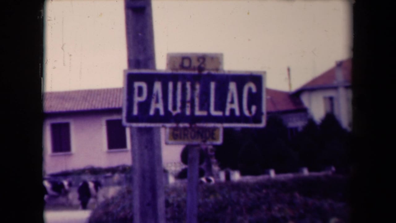 Pauillac sign repeated with cows and houses in the background.