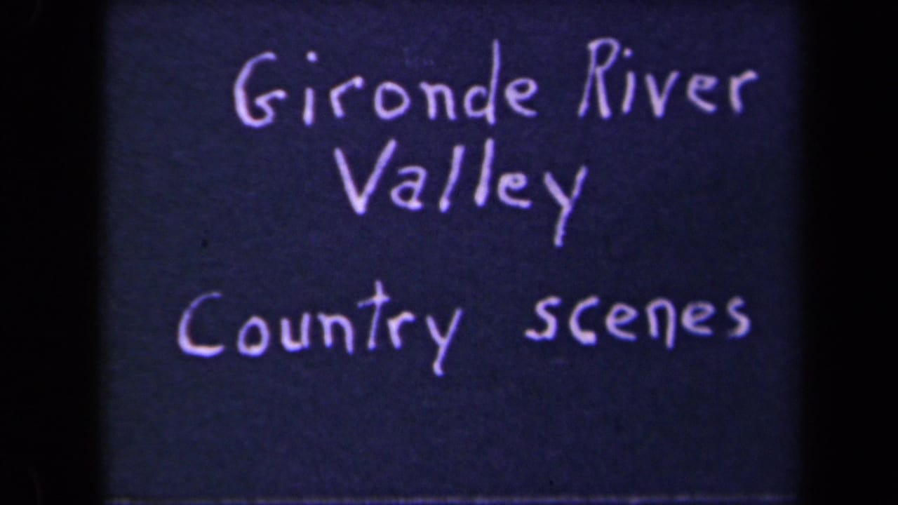A close 8mm frame of the handwritten Gironde River Valley Country scenes card, with soft focus and visible film texture.