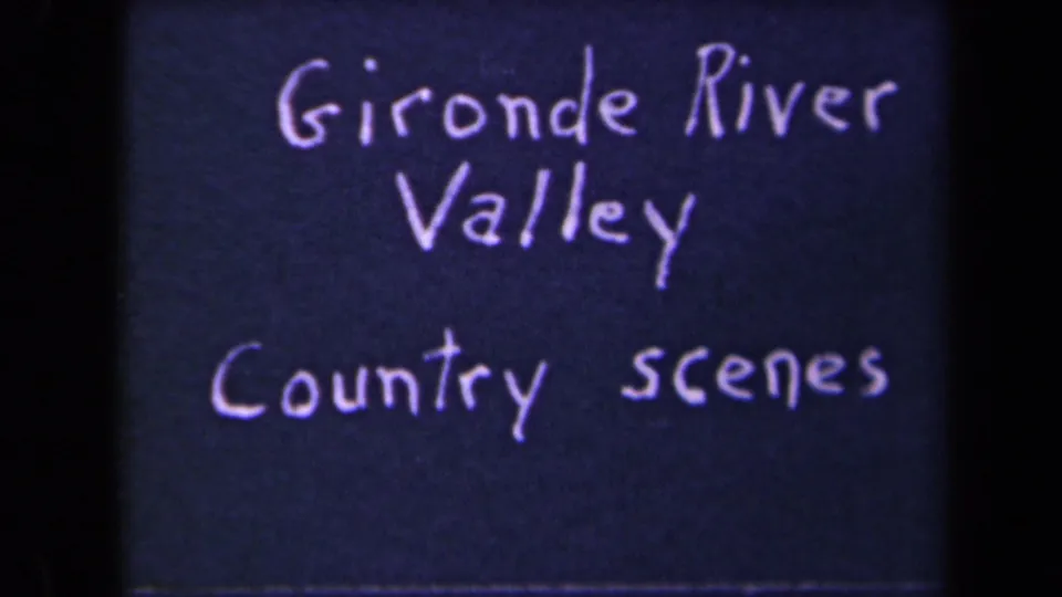 The Gironde River Valley Country scenes title card remains on screen, with handwritten white lettering and visible 8mm film grain.