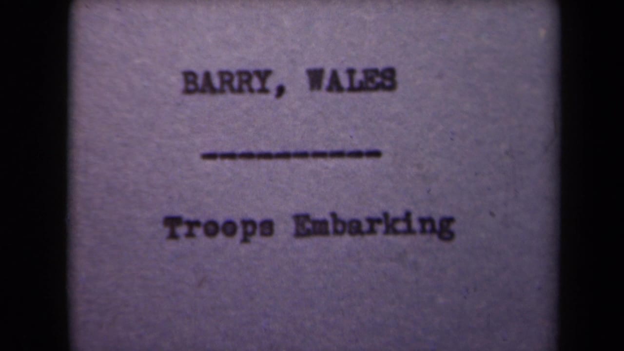 Title card reading "BARRY, WALES" above a dashed line and "Troops Embarking" below.