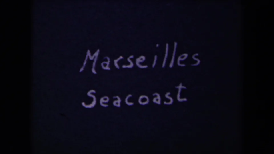 Handwritten 8mm title card identifies the location as Marseilles Seacoast against a dark blue-black field.