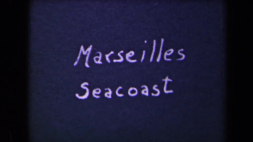 A closer handwritten title card reads Marseilles Seacoast, with soft 8mm grain and uneven exposure visible.