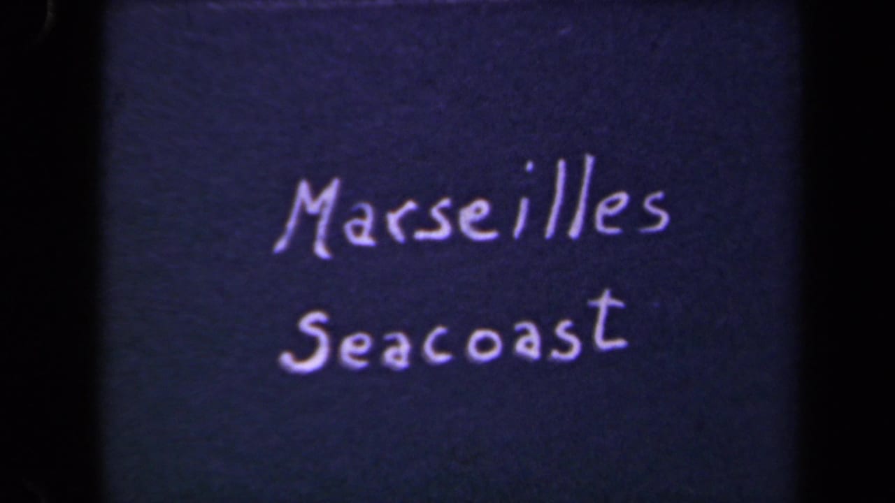 Handwritten title card reading Marseilles Seacoast on dark film.