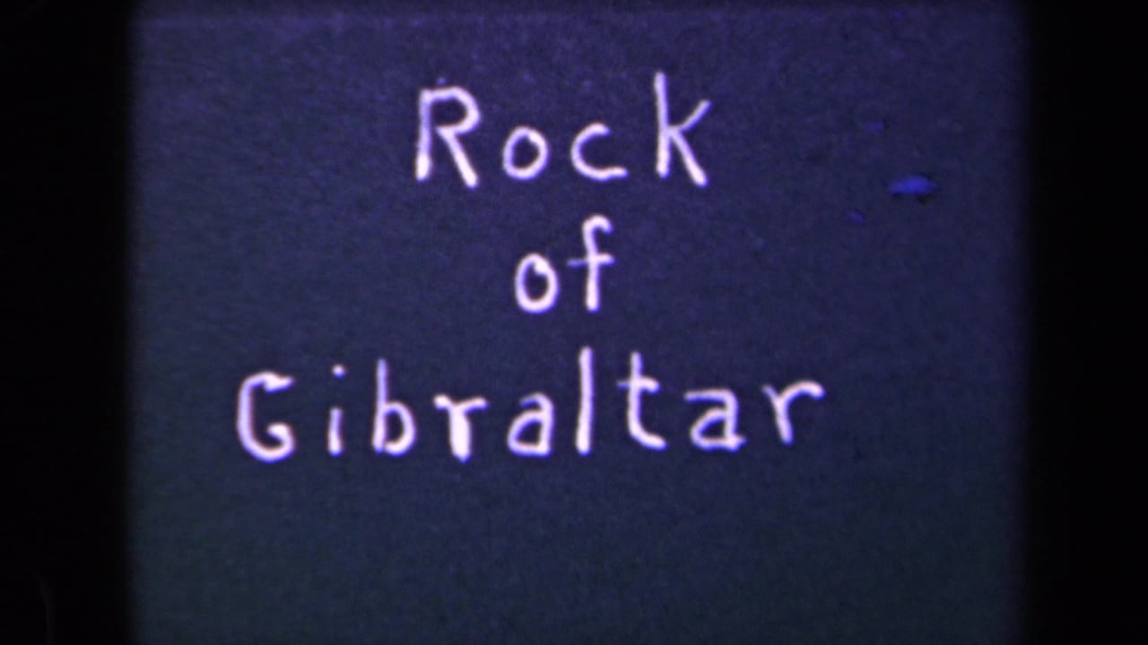 Handwritten title card reads Rock of Gibraltar in white lettering on a dark blue 8mm film background.
