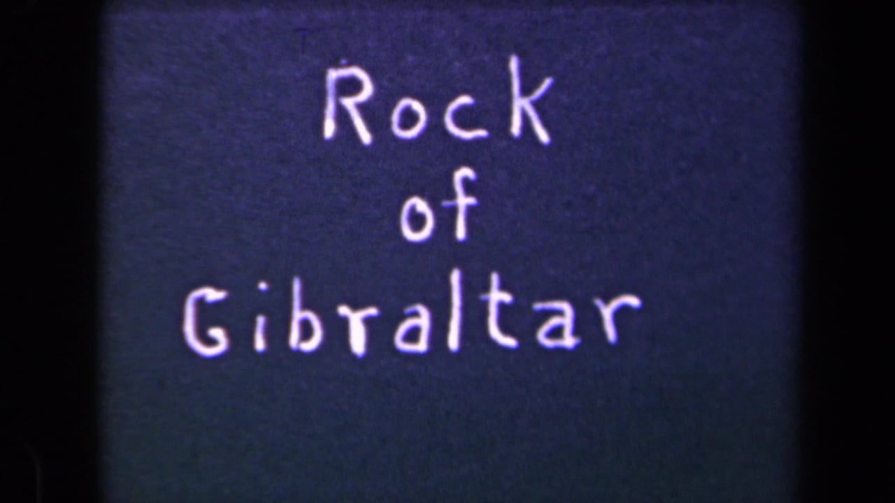 A second 8mm frame shows the handwritten Rock of Gibraltar title card closer in frame, with visible grain and color shift.