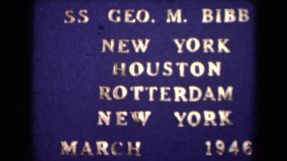 1946 8mm title card for SS Geo. M. Bibb showing New York, Houston, Rotterdam, and New York on a blue background.