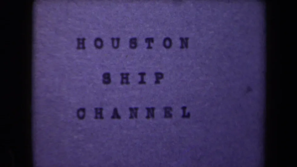 A purple-tinted 8mm title card reads Houston Ship Channel, with soft focus and dark film borders.