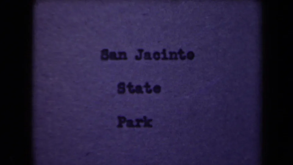 Purple 8mm title card with typewriter-style lettering reading San Jacinto State Park, framed by dark film edges.