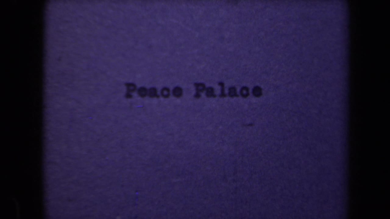 Typed Peace Palace title on a blue-purple film frame with dark gate edges.