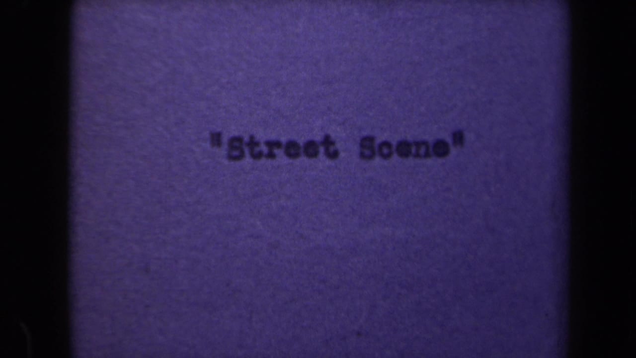 1946 8mm title card for a Netherlands home movie segment, reading "Street Scene" against a faded purple film background.