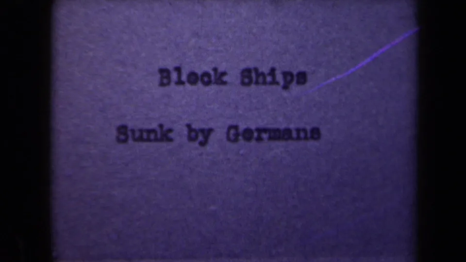 8mm title card states "Block Ships Sunk by Germans," linking the canal scene to wartime obstruction or aftermath context.
