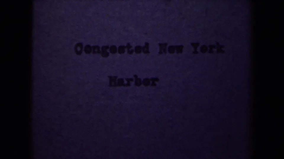 Purple 8mm title card reading Congested New York Harbor, creating a visible label mismatch with the supplied Netherlands metadata.