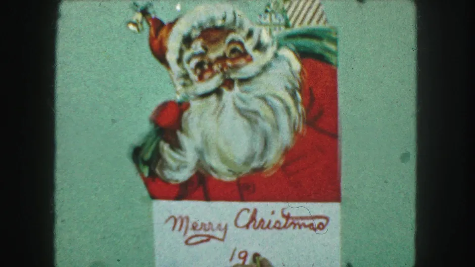 1959 Kansas City frame showing more of the Christmas card, including Santa and the handwritten Merry Christmas greeting with the year below.