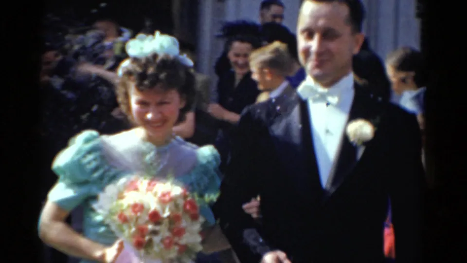 The second 1975 Bridgeport wedding couple is seen closer, with the bride holding a bouquet and the groom in a tuxedo beside her.