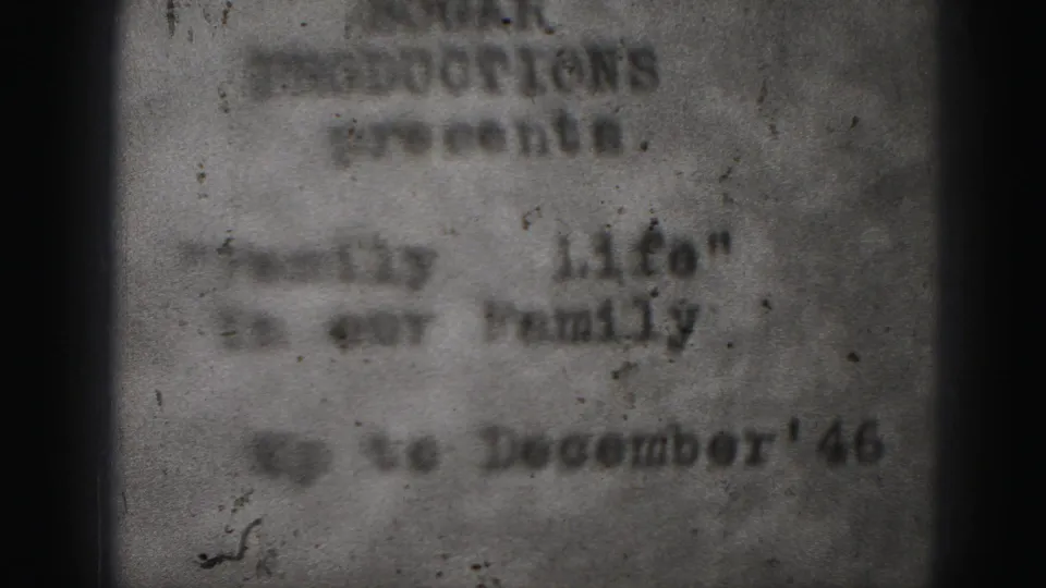 Soft 8mm frame of a typed Harrisburg Productions title card for Family Life, dated up to December 1946.