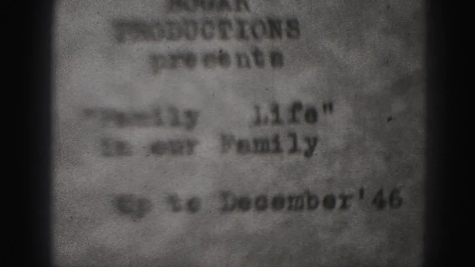 Soft, grainy 8mm frame repeating the Family Life title card associated with Harrisburg, Pennsylvania and December 1946.