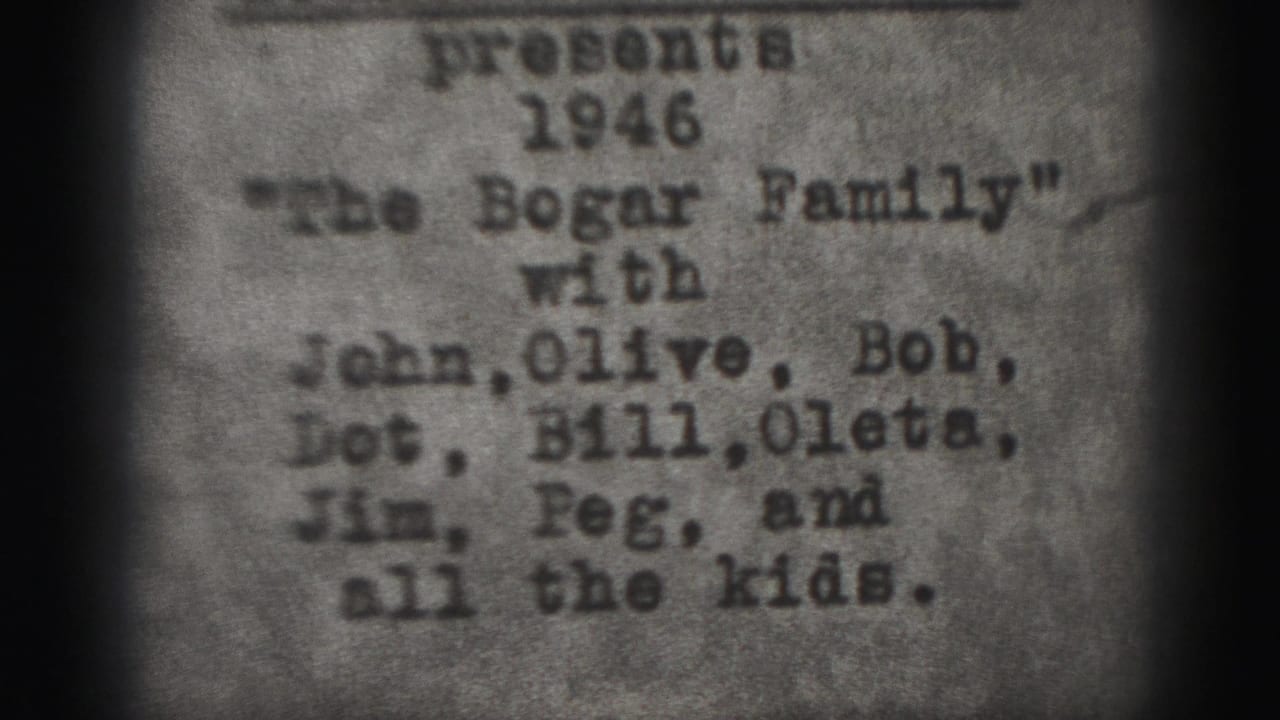 Typewritten 1946 Bogar family title card on grainy monochrome film.