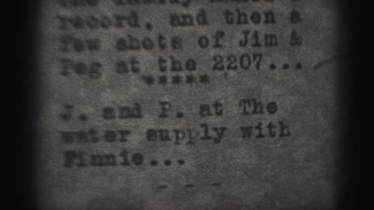 Soft close-up of typed text on aged paper with dark film-frame edges.