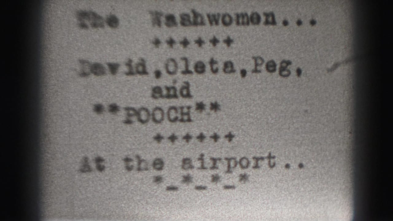Second blurred view of the typed The Washwomen title card.