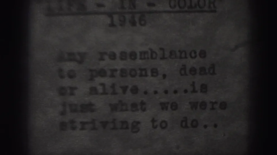 1975 Harrisburg 8mm frame showing a typewritten resemblance disclaimer, partial header text, soft grain, and shadowed frame edges.