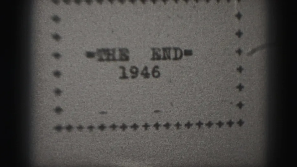 1946 black-and-white 8mm end title card with '=THE END=' and the year below, framed by a dotted border and film-edge shadowing.