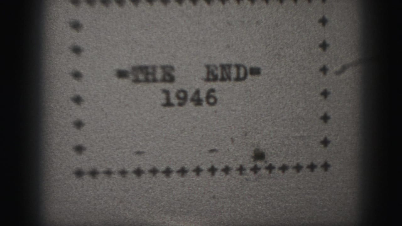 Soft 8mm frame showing a 1946 end title card, with '=THE END=' over the year and a dotted rectangular border.