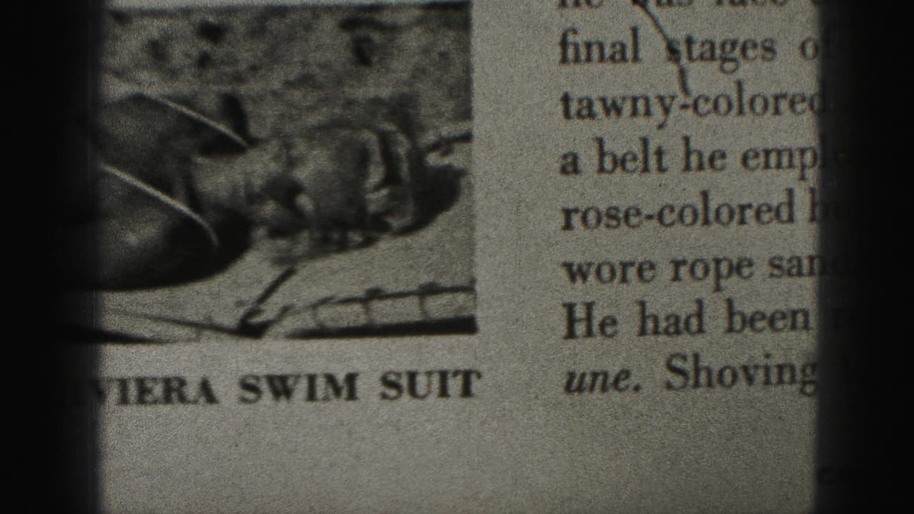 Printed magazine page with part of a swimsuit model photograph and bold text below.