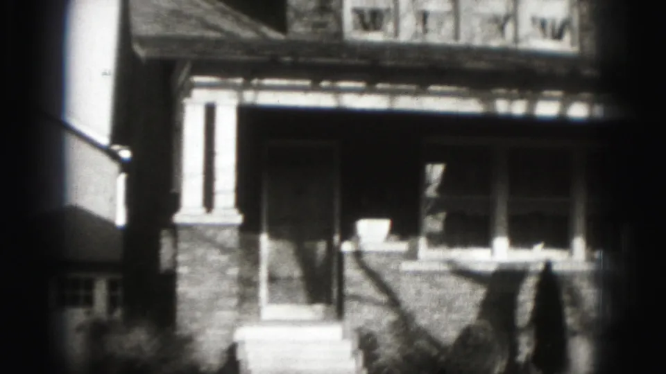 1975 Harrisburg exterior showing the lower porch, front steps, brick facade, and upper windows of a suburban house.