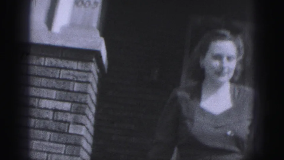 A softer wider view shows the woman near brickwork, possibly seen through or near a reflective surface, with details less distinct.