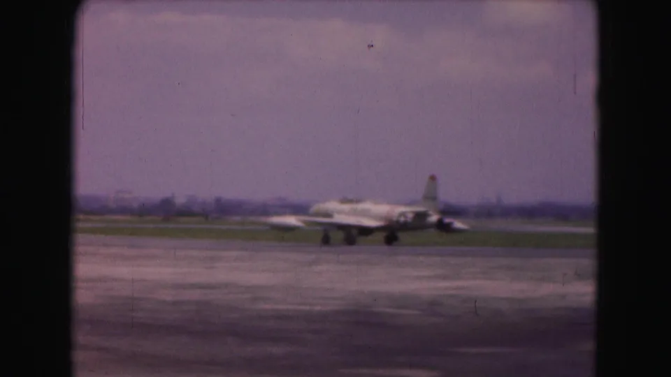 Final 1975 Washington DC frame shows the white insignia-marked jet moving away along the runway.