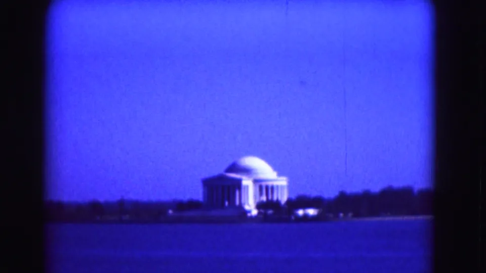 Distant 1975 Washington DC view of the Jefferson Memorial across the Tidal Basin on 8mm film.