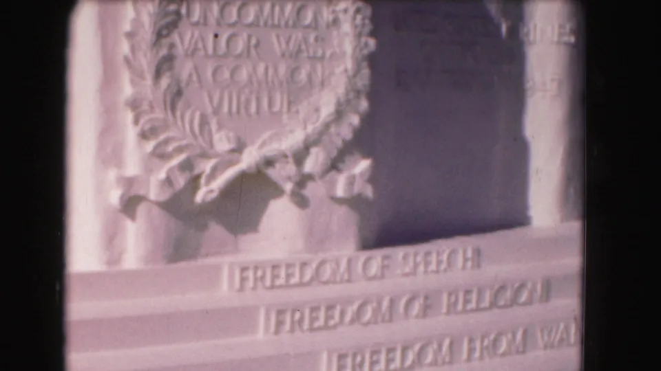 1975 Washington, DC frame showing the laurel relief above engraved lines including Freedom of Speech and Freedom of Religion.