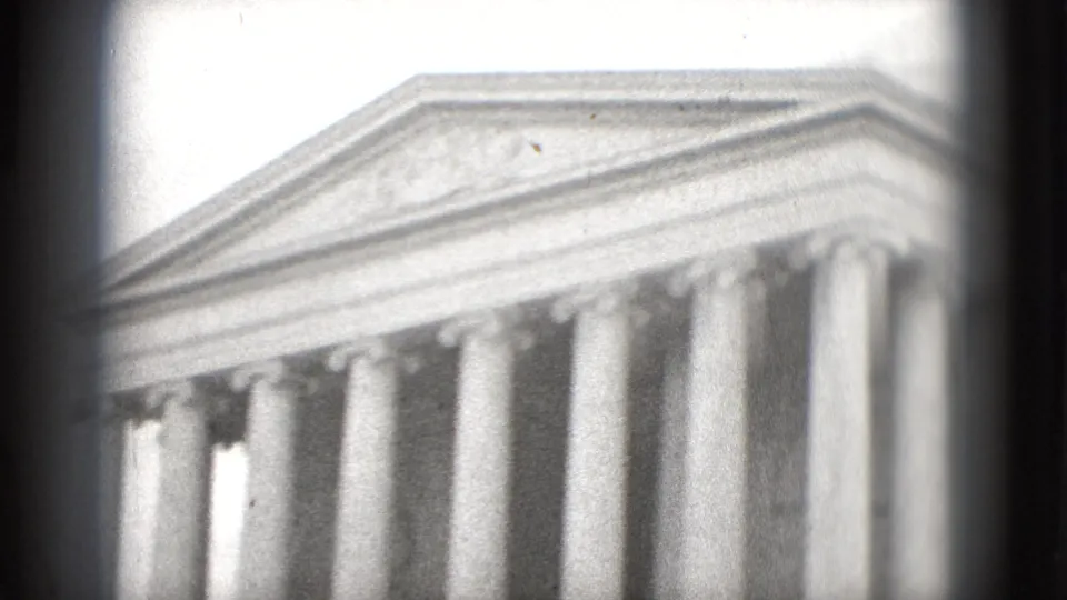 1975 Washington, DC 8mm view of the Jefferson Memorial, showing columns and the pediment in soft, grainy black-and-white.