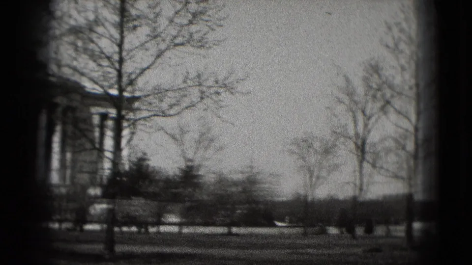 Washington, DC 8mm frame with the Jefferson Memorial slipping to the left edge while bare trees and open grounds fill the view.
