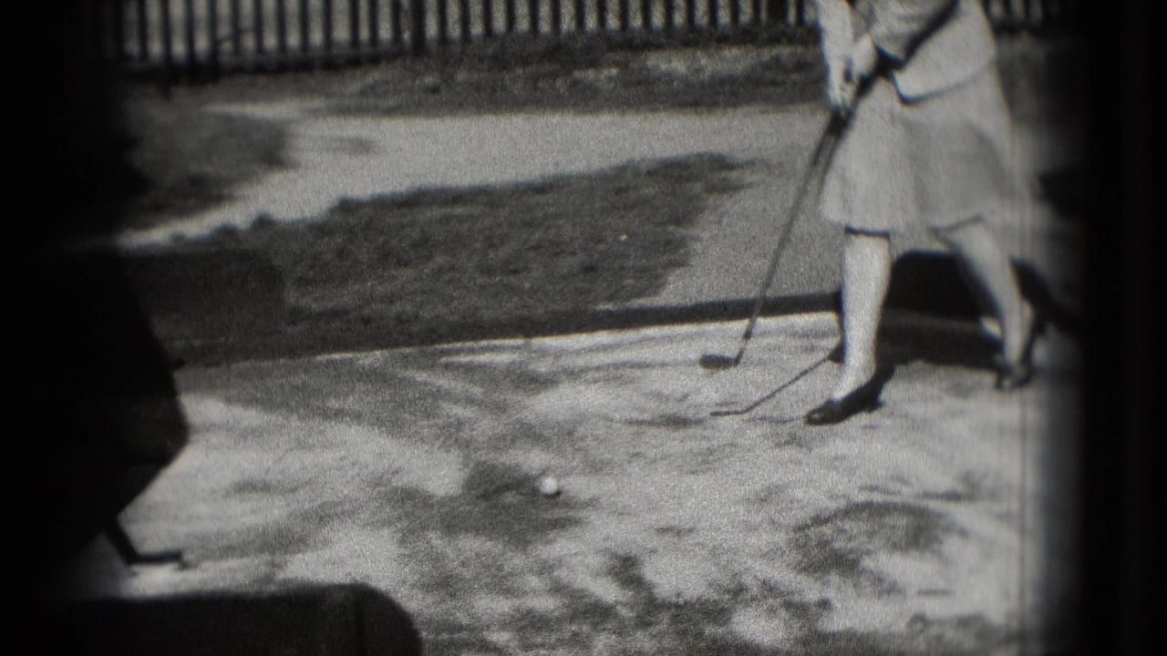 Woman in skirt and short heel pumps stands with a putter near a golf ball on an outdoor surface.