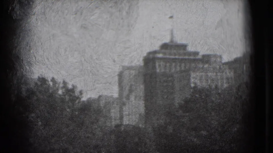 1975 Washington, DC frame with a civic-looking domed or tiered building behind trees, rendered in soft black-and-white 8mm texture.
