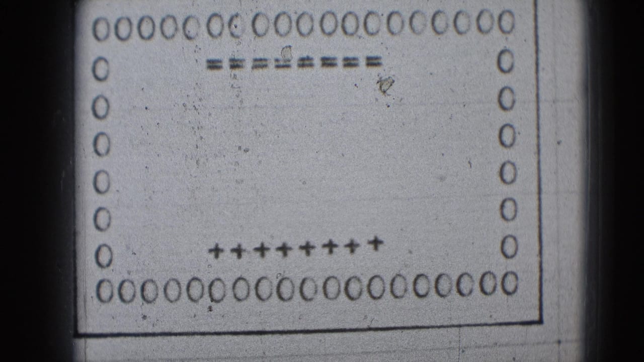 A monochrome 8mm leader frame, associated with Middletown, Pennsylvania metadata, showing perforations, guide marks, and no completed name yet.
