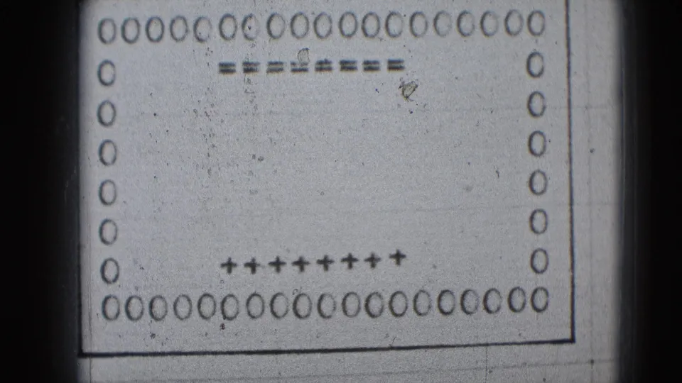 A monochrome 8mm leader frame, associated with Middletown, Pennsylvania metadata, showing perforations, guide marks, and no completed name yet.