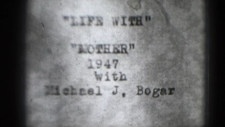 Final visible 8mm frame of the LIFE WITH MOTHER title card, with 1947 and Michael J. Bogar readable.